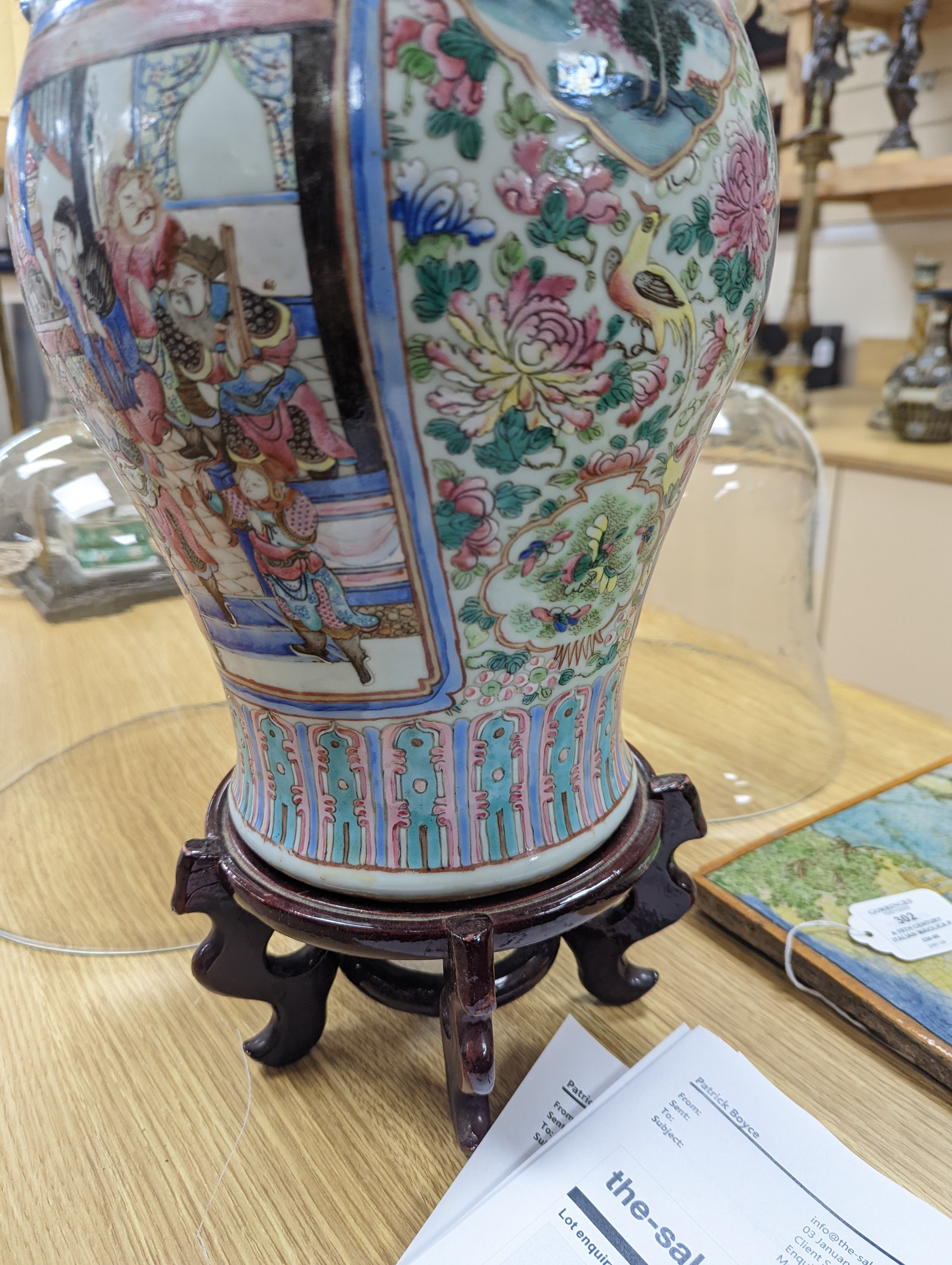 A large Chinese famille rose two handled vase, late 19th century, wood stand, restored 54cm incl stand